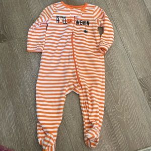 My first Halloween footie 9 months old orange and white stripes, super soft,